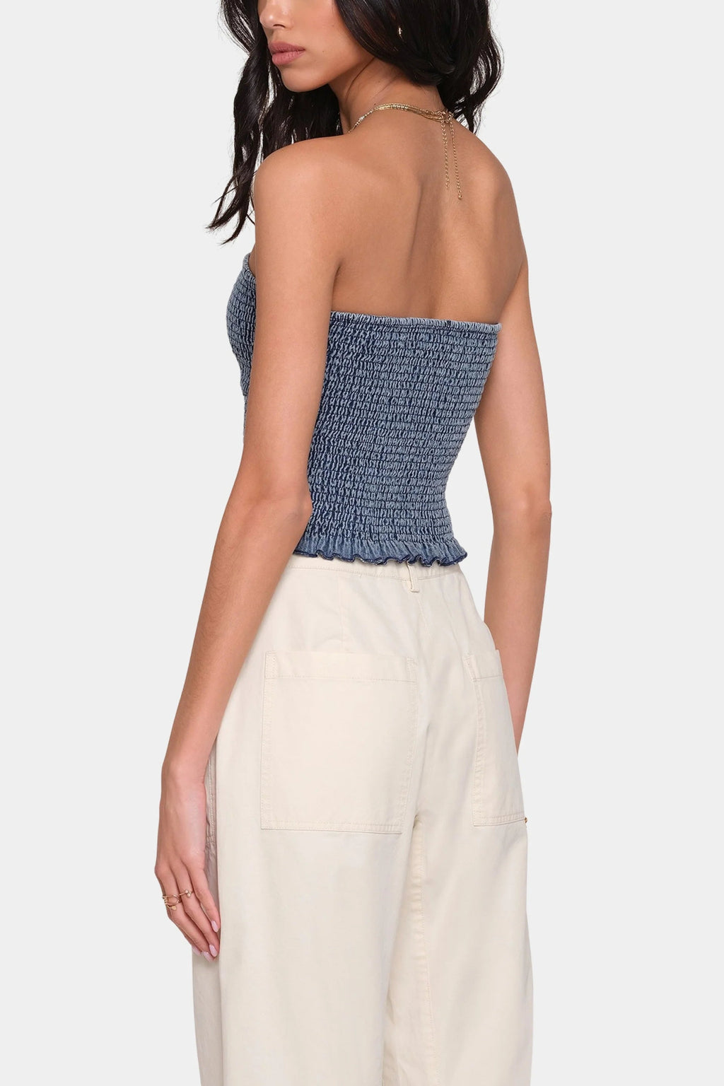 Back view of Heartlooms Miska top with cream pants.