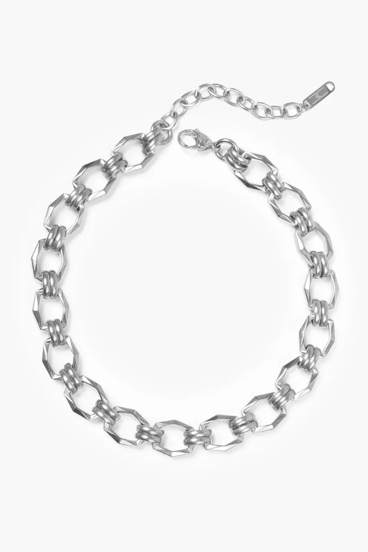 Silver chain necklace on a white background