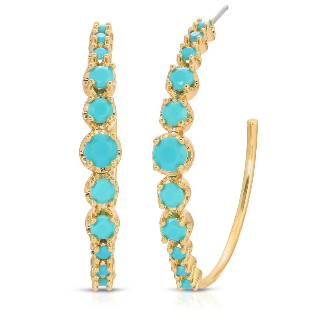 Gold hoop earrings with turquoise stones on a white background