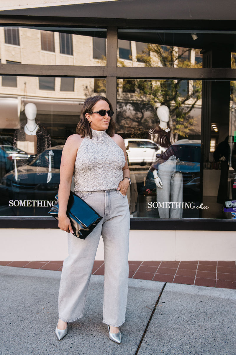 SLEEVELESS HALTER SWEATER