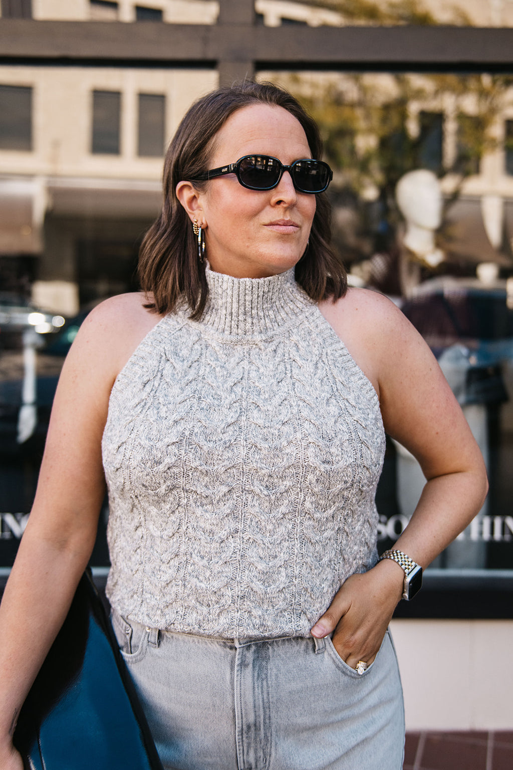 SLEEVELESS HALTER SWEATER