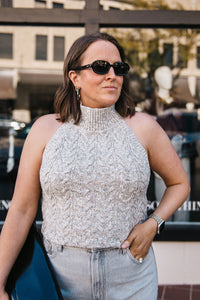 SLEEVELESS HALTER SWEATER