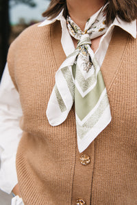 SLEEVELESS KNIT CARDIGAN