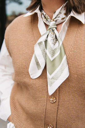 SLEEVELESS KNIT CARDIGAN