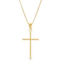 Gold cross pendant on a white background