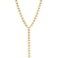 Gold heart-shaped necklace on a white background.