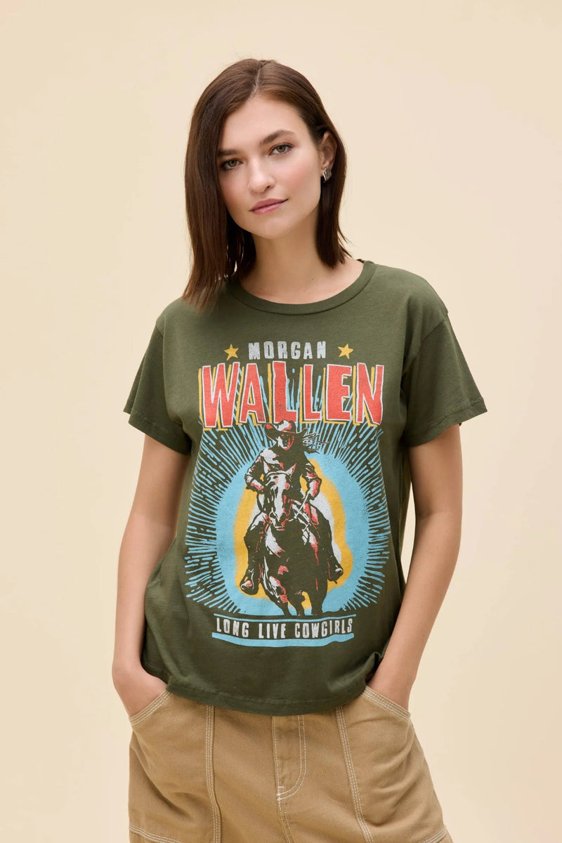 A girl wearing a Morgan Wallen graphic tee with tan pants.