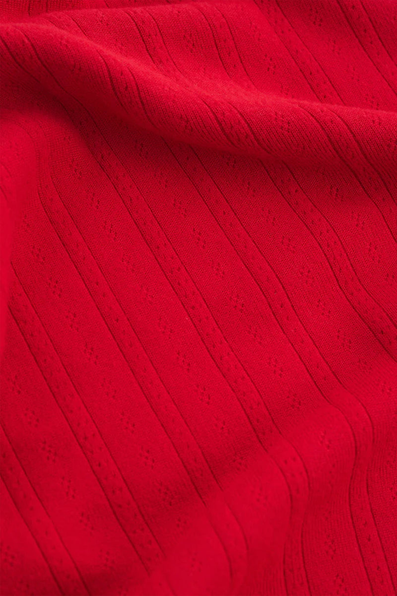 Close-up of red textured fabric.