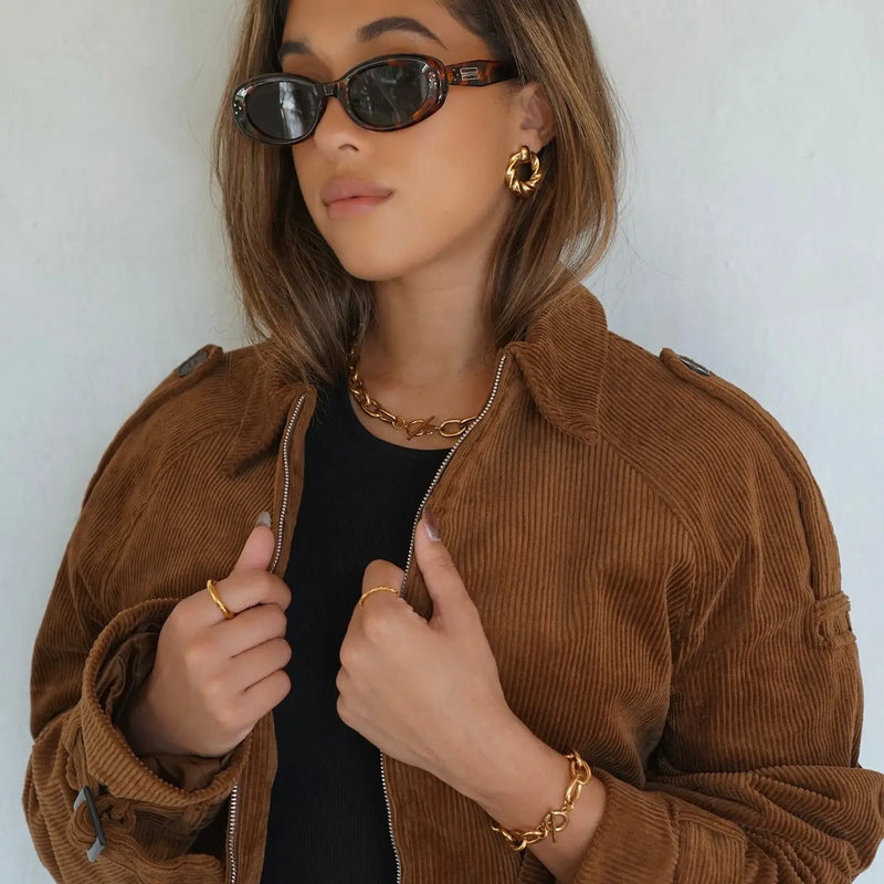 TWIST KNOCKER EARRING